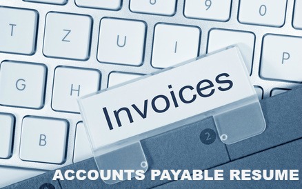 File with tab reading INVOICES and part of a computer keyboard